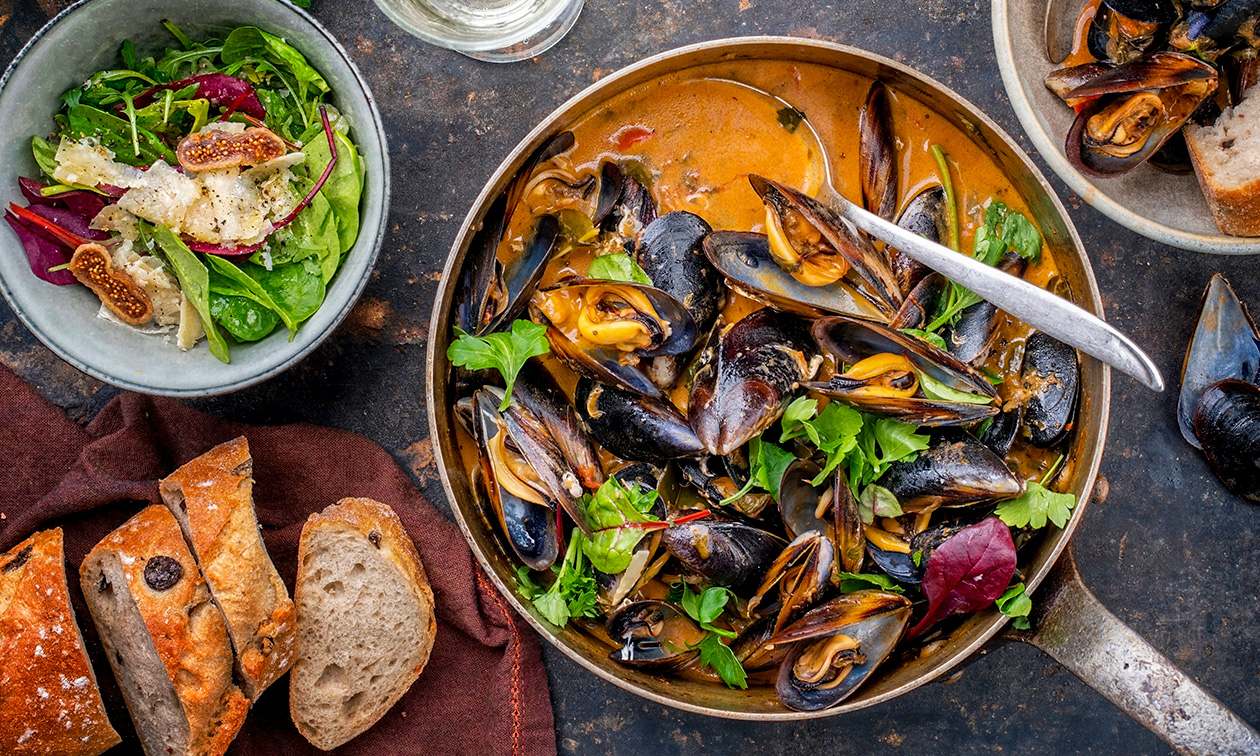 2-gangen mosseldiner aan het strand